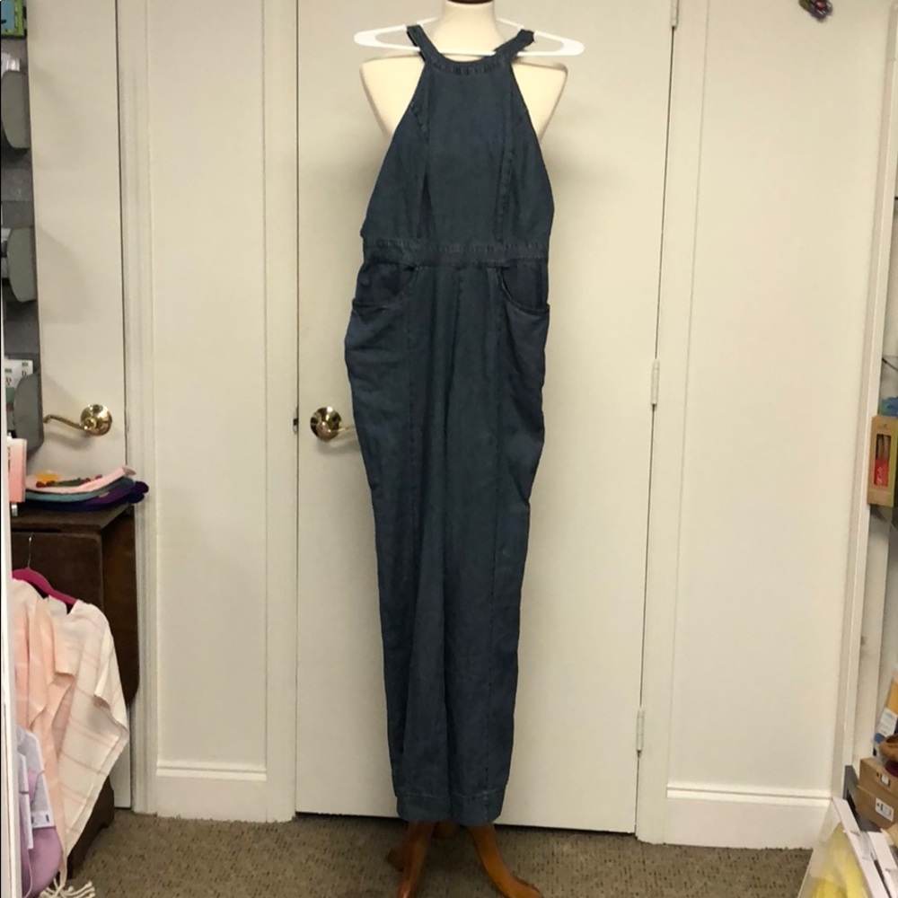 NWT. Overalls with pull tag missing.